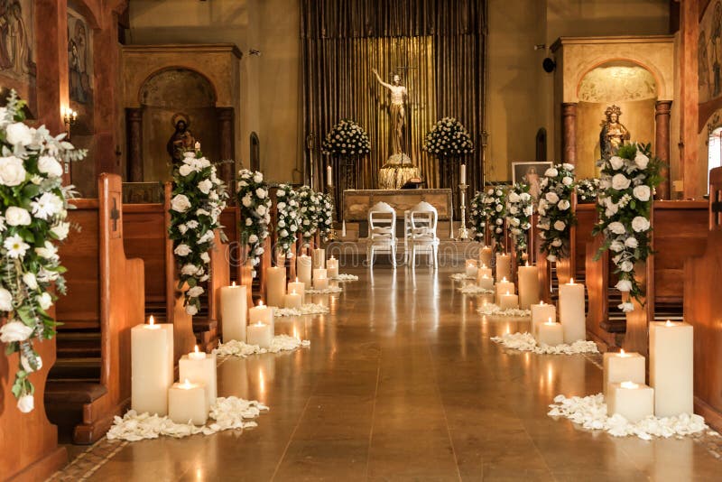 a chapel inside, decorated for a marriage